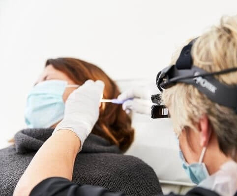 Ear wax removal for both ears by Microsuction